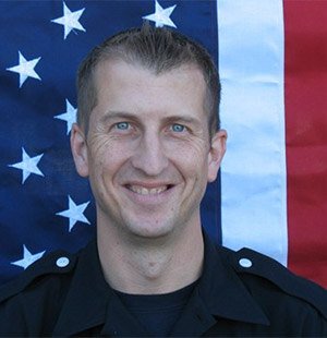 Sean O'Connor  Headshot with American Flag